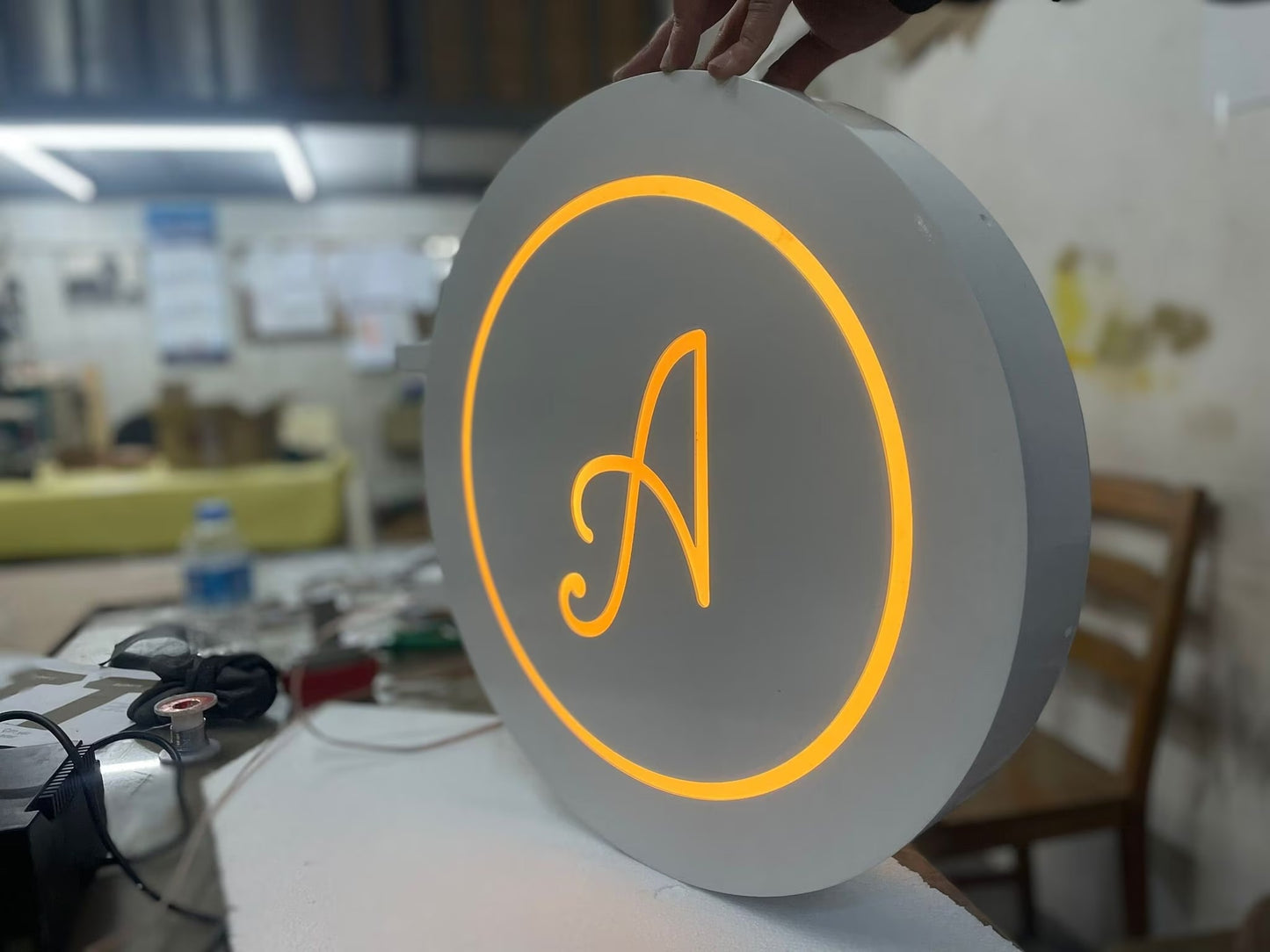 Illuminated Round Blade Sign - Metallionaire