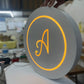 Illuminated Round Blade Sign - Metallionaire